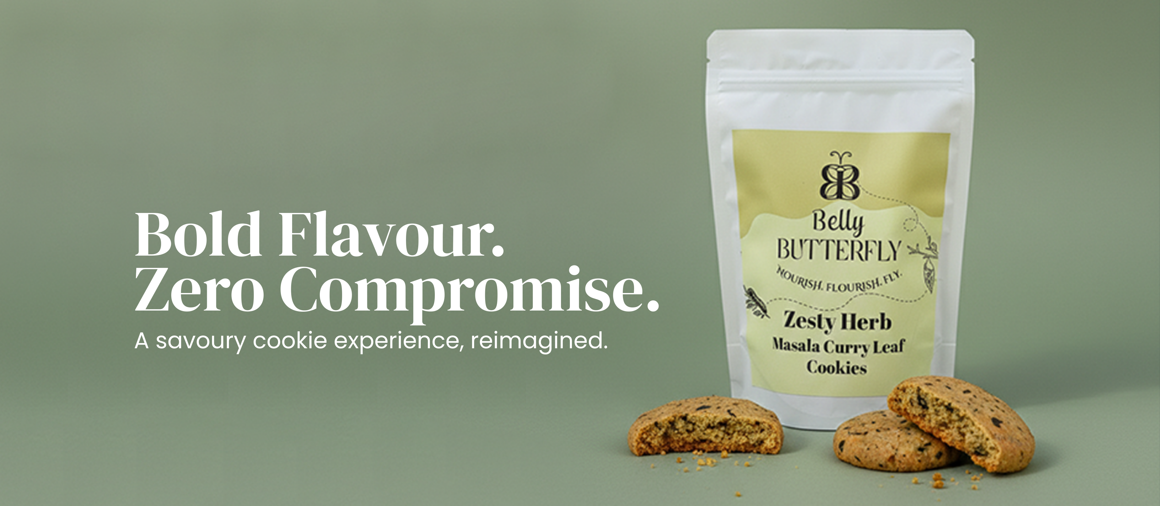 Belly Butterfly zesty herb gluten free cookies with packaging on a green background